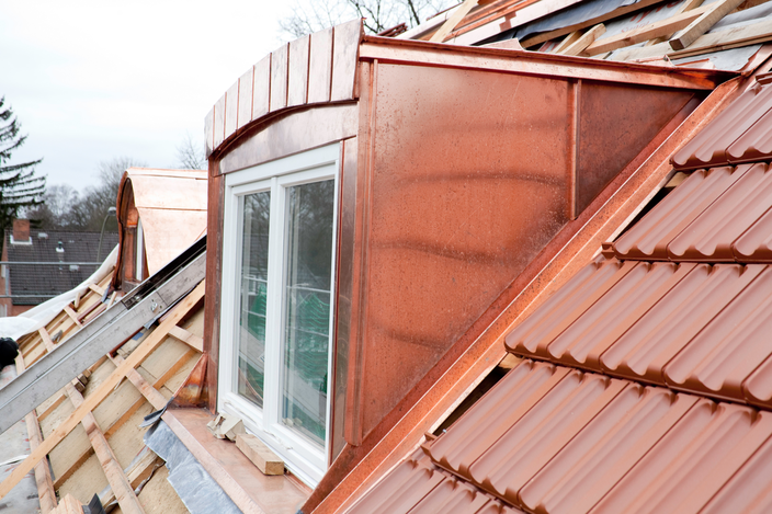 New metal Roof with Tan metal Tiles with Dormer window built in Georgina Ontario