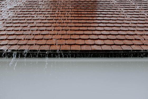 Inadequate Roof Gutter allowing water to overflow off roof in Angus, Ontario. 